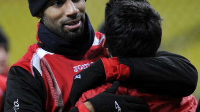 Frederic Kanoute (L)