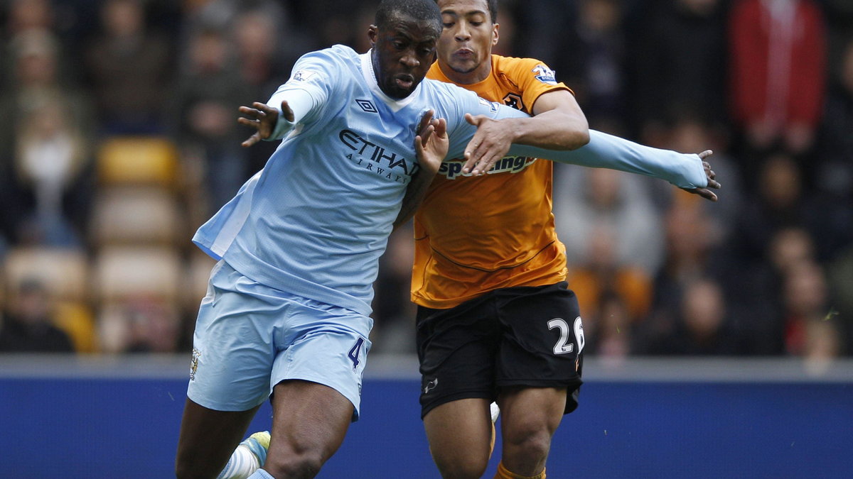 Yaya Toure (L)