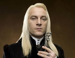 B) Lucjusz Malfoy