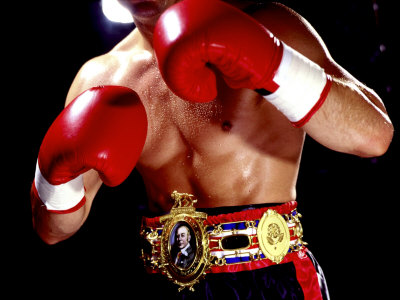 torso-of-a-male-boxer-wearing-boxing-gloves-and-a-belt.jpg