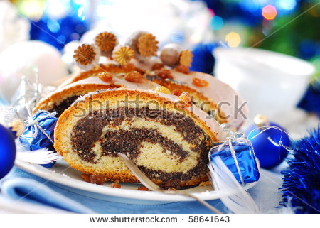 stock-photo-traditional-poppy-cake-with-icing-and-raisins-for-christmas-58641643.jpg